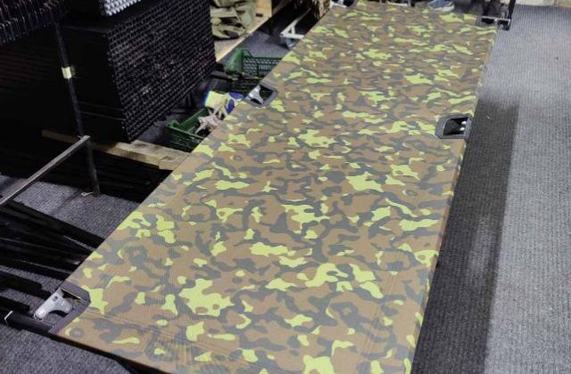 Folding military beds
