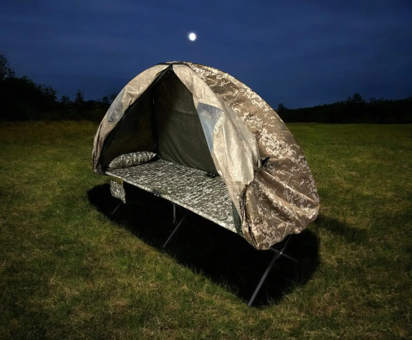 Rain tent for a folding bed with an anti-mosquito net